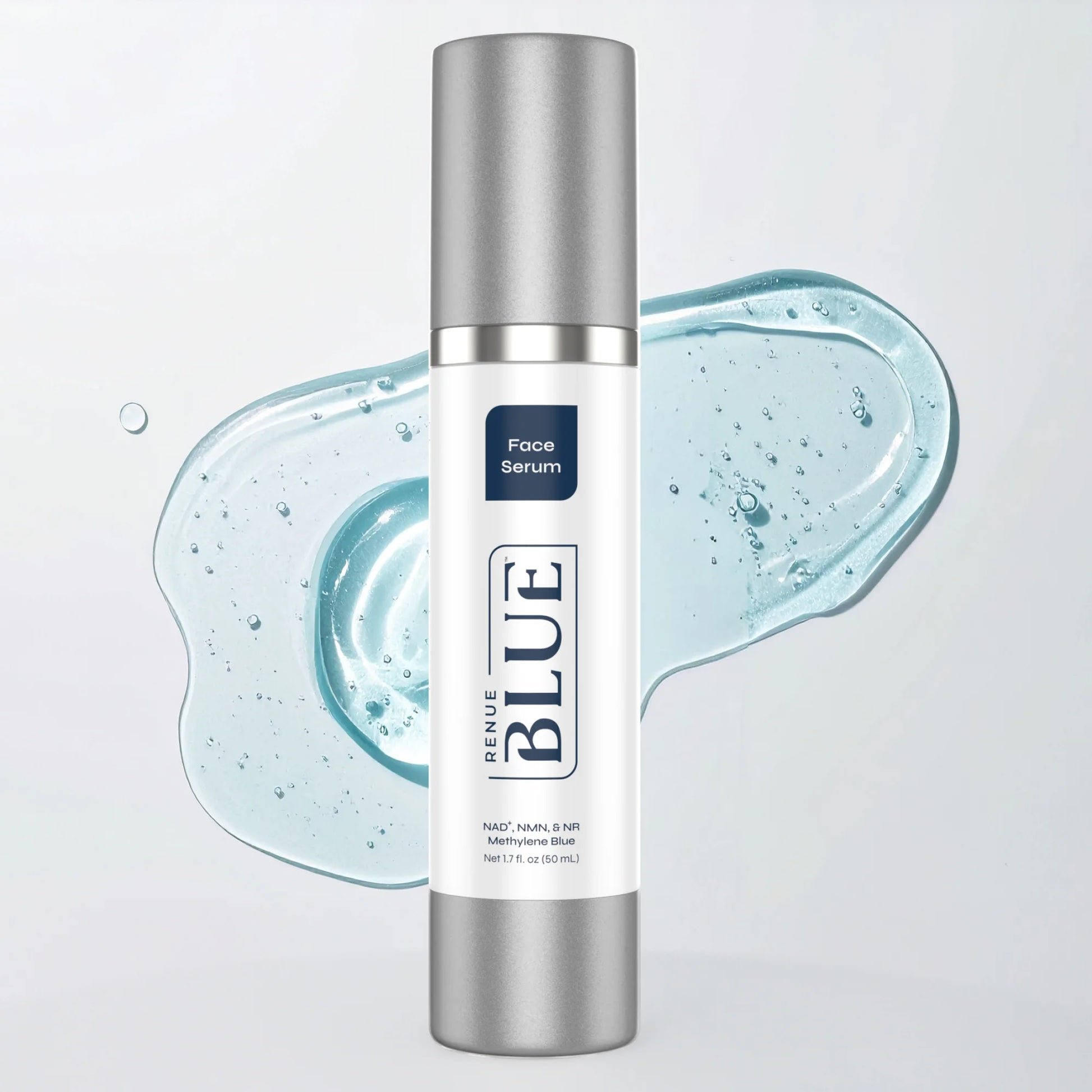 Blue Face Serum bottle with blue liquid droplet on a light gray background
