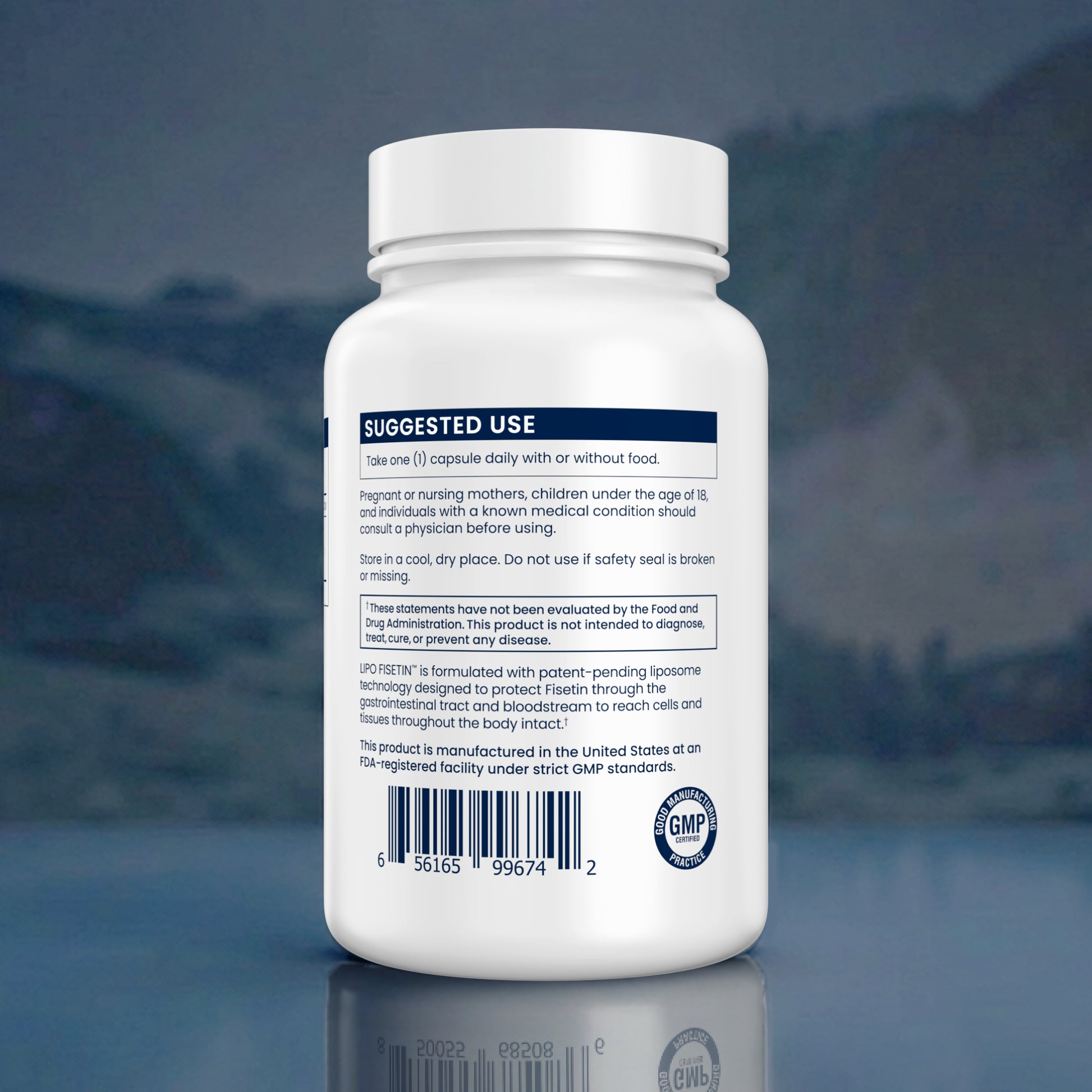 Tall white container with label on a blurred natural background